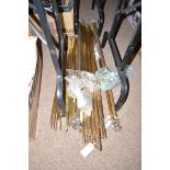 A collection of three different sorts of brass stair rods; a bag of clips; a bag of door furniture;