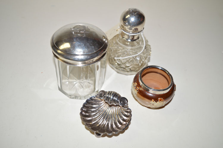 A late Victorian silver shell pattern table salt; a cut-glass hat pin pot with silver cover;