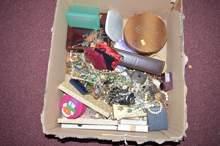 A large quantity of costume jewellery; cocktail watches; etc.