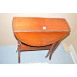 An Edwardian inlaid mahogany small Sutherland table.