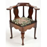 A George II mahogany corner chair,