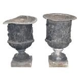 A pair of 19th Century cast lead garden urns,