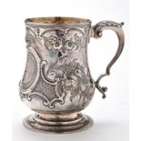 A Victorian mug, maker's mark indistinct, London 1861, baluster-shaped,