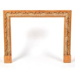 A Georgian style carved and stained pine fire surround,