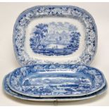 Three blue and white Pearlware printed dishes, each with rural scenes, the longest length 41.5cms.