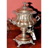 A 19th Century plate-on-copper campana-shaped tea urn, 17 3/4in. (45cms).