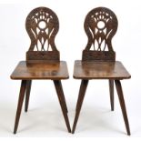 A pair of 19th Century German oak country chairs,