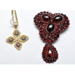 A Victorian red paste brooch, in garnet style,