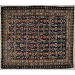 A Baluch rug, with repeated floral designs to field and triple floral border, 64 x 48in.