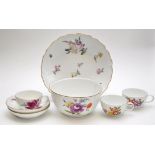 Meissen shallow bowl, painted with floral bursts, diameter 23.