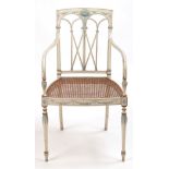 A  Regency cream painted beech open arm chair,