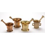 Two bronze and two brass pestle and mortars, 18th and 19th Century,