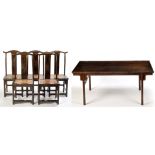 A Chinese stained wood "Artist's" table and six chairs, the table with rectangular top,
