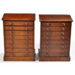 A pair of late Victorian stained softwood specimen cabinets,