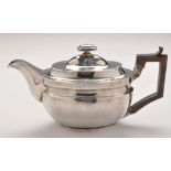 A George III teapot, by Stephen Adams I, London 1807, oval with concave band,