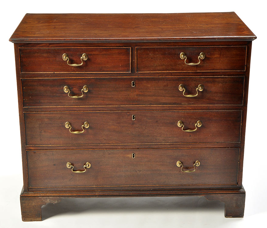 A George III mahogany chest of two short and three long graduated drawers,