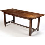 A rustic oak and elm refectory dining table, the plank top probably 19th Century,