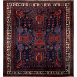 An Afshar rug, the central field decorated with geometric forms and stylised floral splays,