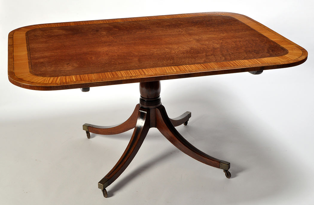 An early 19th Century mahogany tip-up-top breakfast table,