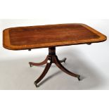 An early 19th Century mahogany tip-up-top breakfast table,