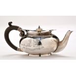 An Edwardian bachelor's teapot, maker's mark worn, Birmingham 1906, squat circular,