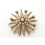 A Victorian diamond star pattern brooch,