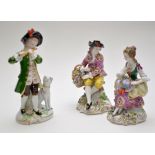 Sitzendorf figure of a flute player, wearing a green coat with seated hound at his side,