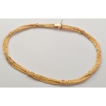 A 9ct. yellow gold twist link necklace, 42cms long, 40grms.