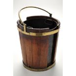 A George III mahogany and brass-bound plate bucket, later metal liner, 17in.