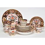 Spode part tea service, comprising: five cups and seven saucers, two shallow bowls,