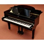 An Offenbach baby grand piano in black lacquered case, retailed through Tynedale Piano Company, no.