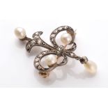 A Victorian diamond and pearl set brooch, of fleur-de-lys form,