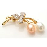 A diamond, cultured pearl and 18ct.