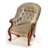 A Victorian mahogany easy chair, the button back,