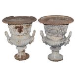 A pair of 19th Century cast iron half-fluted campana form garden urns,