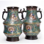 A pair of Chinese cloisonne vases, sides decorated with lotus scrolls,