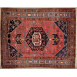 A Brojerd rug, the central medallion to field decorated throughout with stylised floral designs,