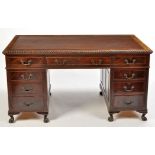 An early 20th Century mahogany pedestal desk,