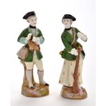 Pair of German scent bottles, modelled as a huntsman and companion, after Meissen,