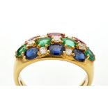 A ruby, emerald, sapphire and diamond ring, set with oval facet cut gemstones,