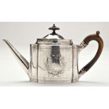 A George III teapot, by Solomon Hougham, London 1795, fluted oval, vacant cartouches, canopy finial,