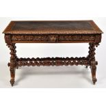 A Victorian carved oak library table,