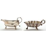 A George III sauce boat, maker's and date mark worn, oval with straight gadrooned border,