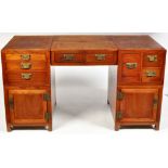 A Chinese hardwood campaign style partner's desk,