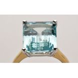 An aquamarine ring, the baguette cut aquamarine weighing approximately 6.