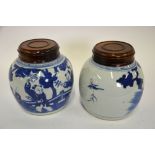 A matched pair of Chinese early 19th century blue and white ovoid vases, each decorated with boys