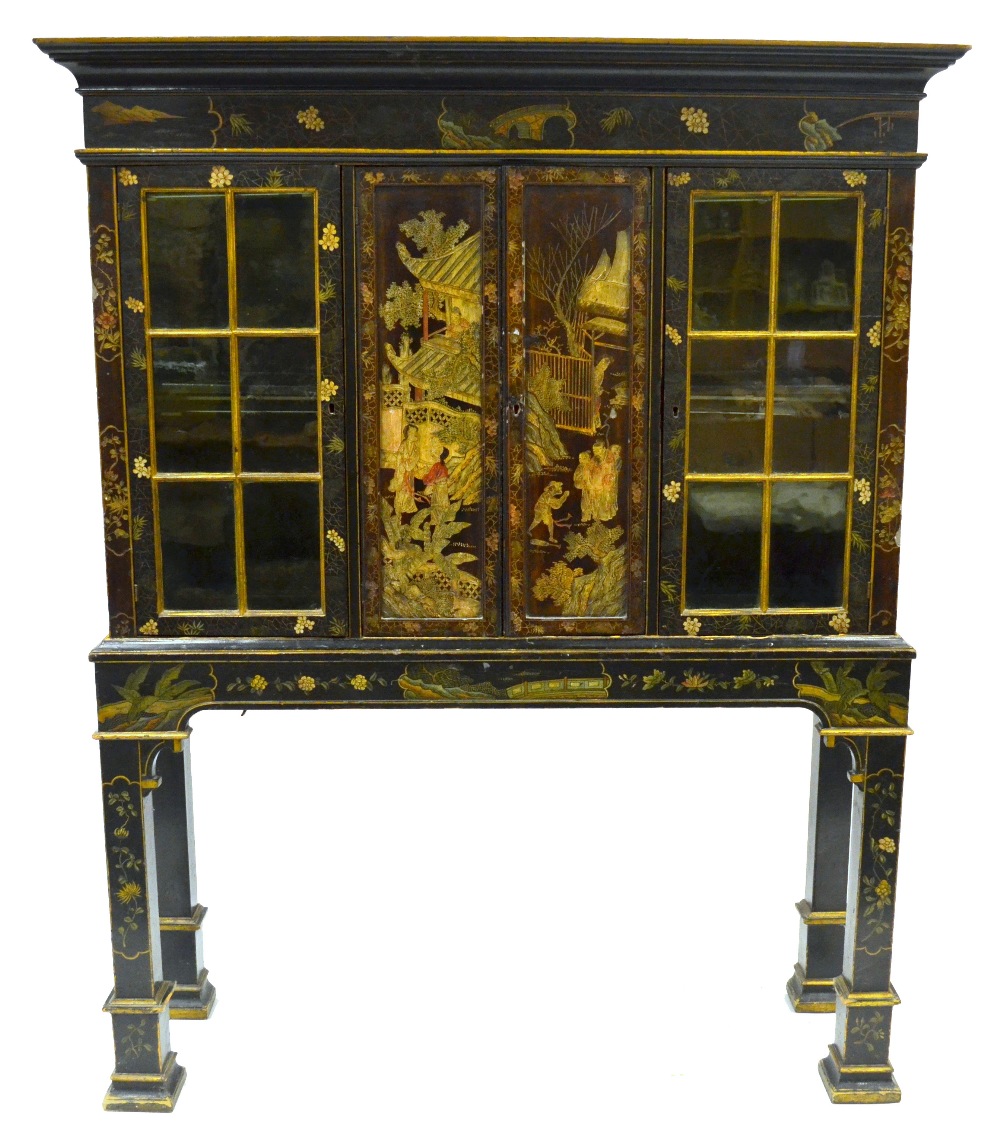 A 19th century Chinese black lacqured cabinet decorated overall with gilt and poychrome, the moulded