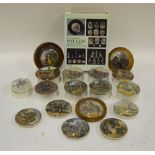 Sixteen Pratt pot lids and nine bases, three in wooden frames including:  A Pair; War; The Village