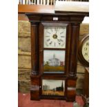 A 19th century American mahogany wall clock with cornice top and turned pilasters flanking two glass