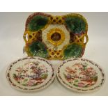 A Victorian majolica rectangular dish decorated with a central sunflower and leaves to/w two early